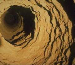 Counteracting ring formation in rotary kilns